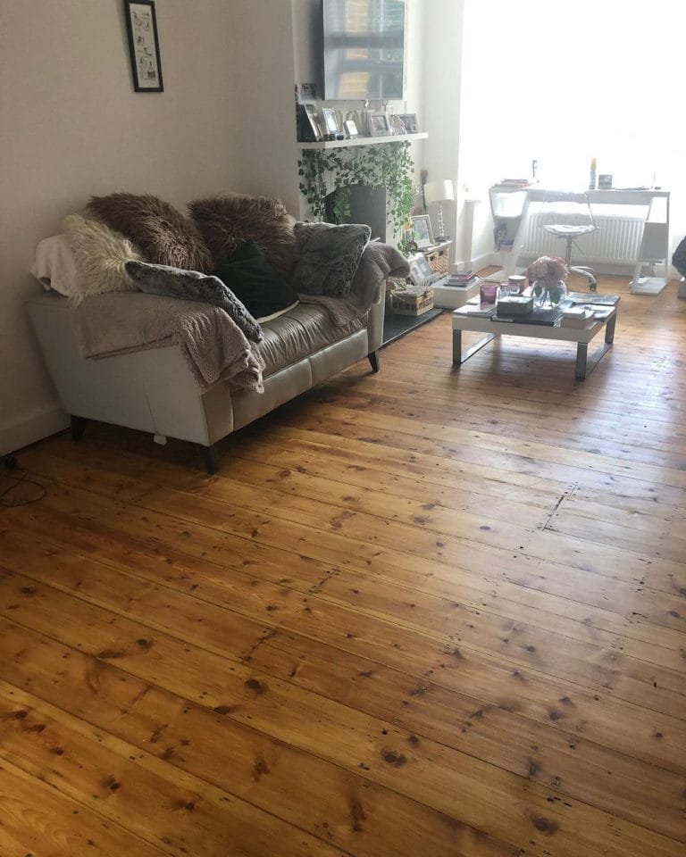 Pine floor refinished with a pigmented oil.