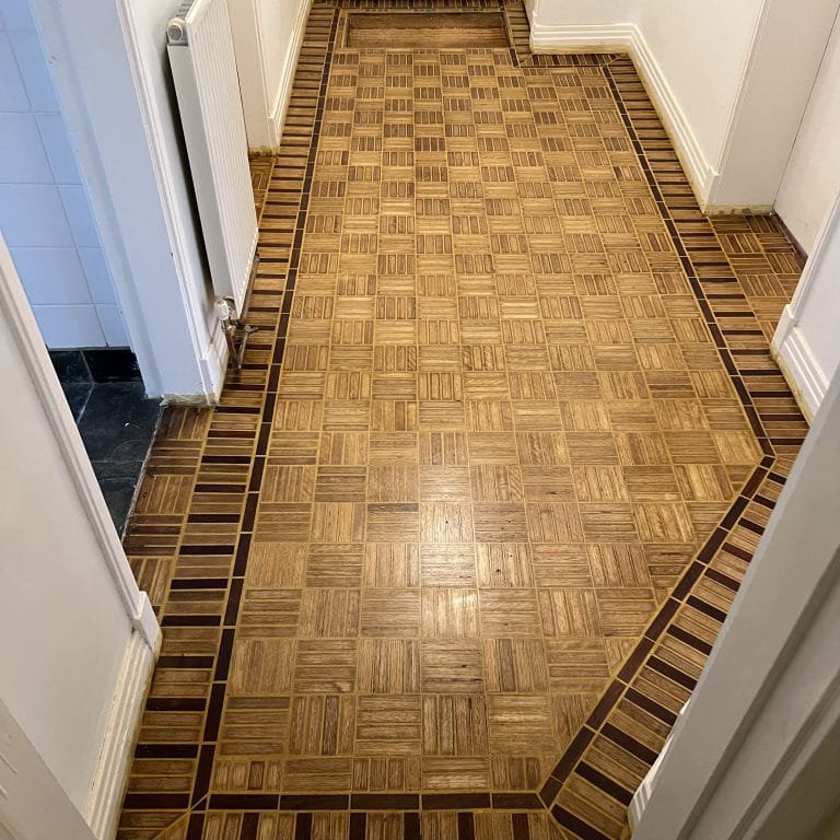 Custom parquet flooring sanded and refinished.